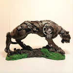 Mechanical panther figurine with gears on a white background